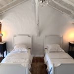 La Maison Nid. The two single beds in the second bedroom.